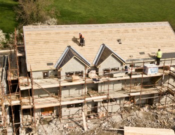 professional roofing job aerial drone shot