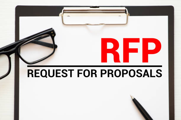 RFP- Request For Proposal written in notebook.